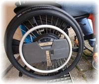 Aufnahmen eines Rollstuhlhinterrades mit Wheeldrive Antrieb.